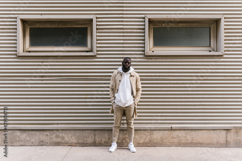 Young African-American man standing on the street