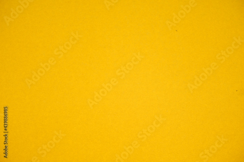 Yellow cardboard texture. Suitable for backgrounds.