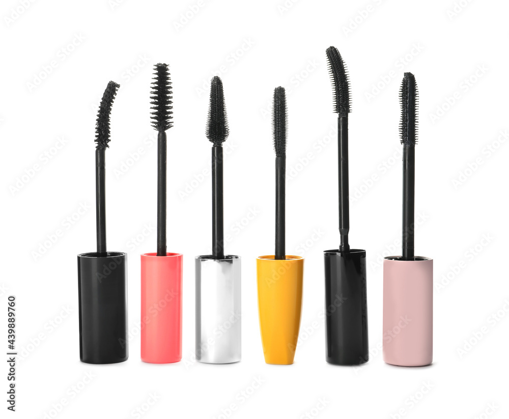 Many mascara wands for eyelashes on white background. Makeup product Many mascara wands for eyelashes on white background. Makeup product