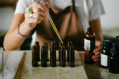Perfumer creating an oil scent