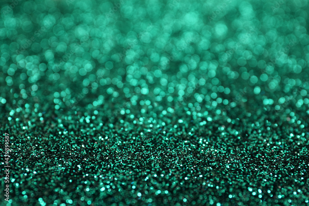 Shiny green glitter as background. Bokeh effect Shiny green glitter as background. Bokeh effect