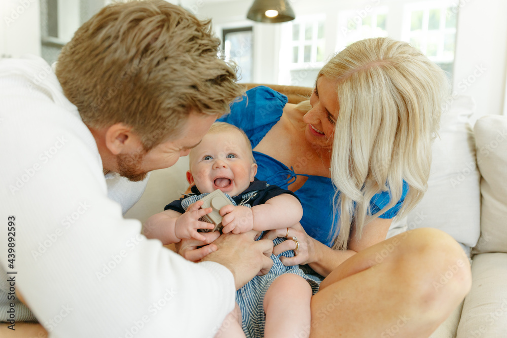 Parents playing with their son Parents playing with their son