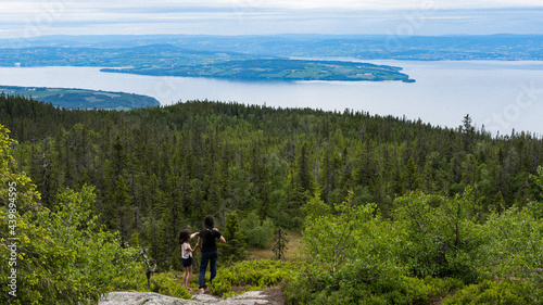 Watching the view of Lake Mjøsa from Hervenknappen up in the Totenåsen Hills.