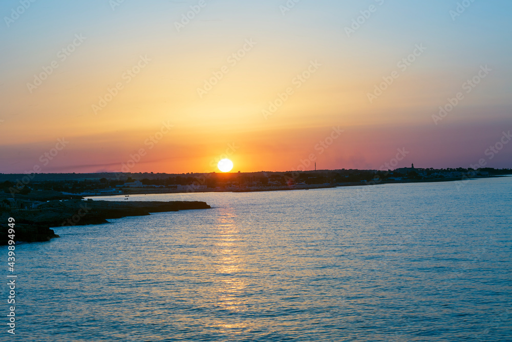 Sunset in Polignano a mare, in Bari in Puglia, a village by the sea