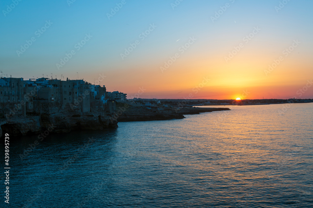 Sunset in Polignano a mare, in Bari in Puglia, a village by the sea