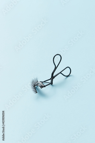 Eyelash curler with false eyelashes
