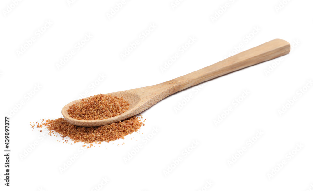 Natural coconut sugar in wooden spoon isolated on white Natural coconut sugar in wooden spoon isolated on white