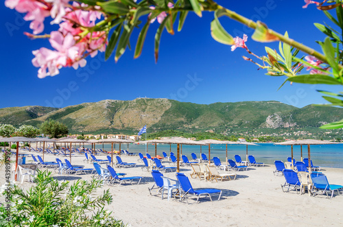 Picturesque sandy beach in Alykanas full of beautiful flowers and plants situated on the east coast of Zakynthos island, Greece.
