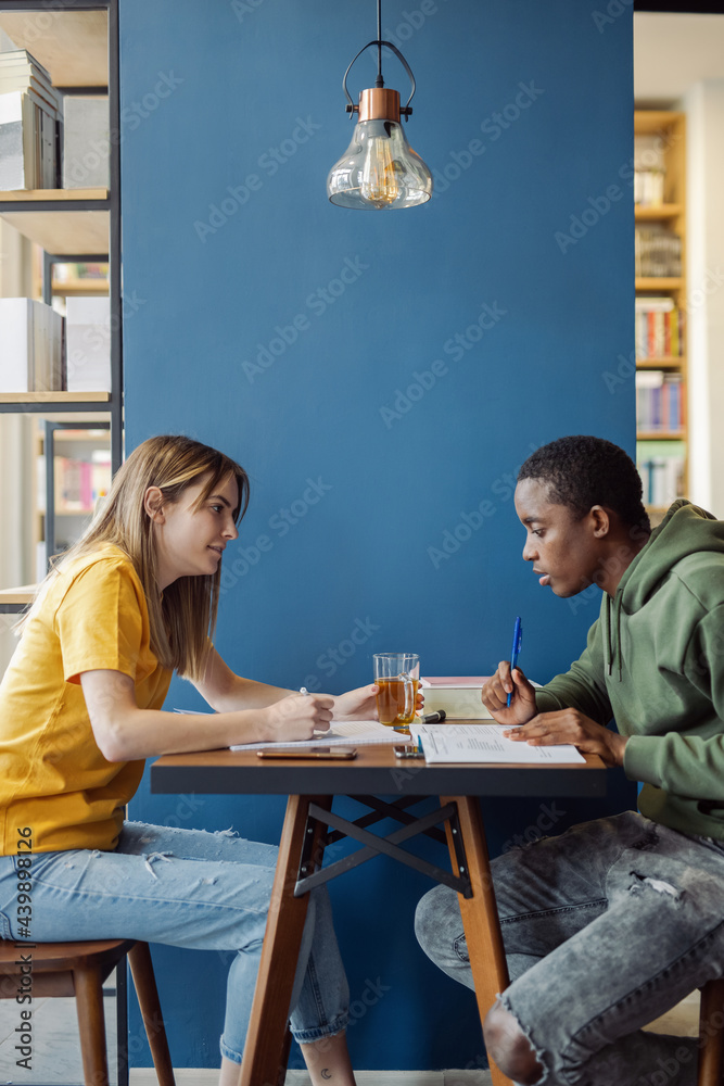 Two Young Students Reading Two Young Students Reading