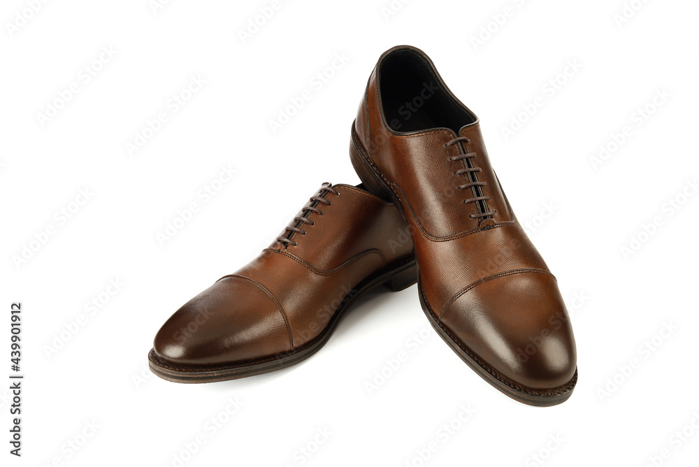 Men's brown oxford fashion shoes isolated on a white background. Men's brown oxford fashion shoes isolated on a white background.