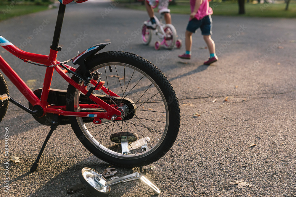 Training Wheels being removed from Bike Training Wheels being removed from Bike