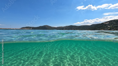 Sea level and underwater photo of Agia Marina beach in Attica, Greece