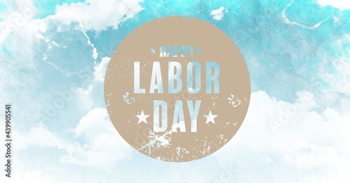 Happy labor day text over round banner against grunge effect over clouds in blue sky