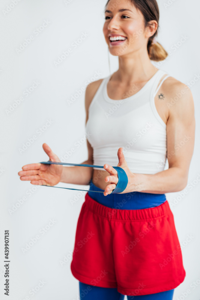 Sportswoman Exercising in Studio