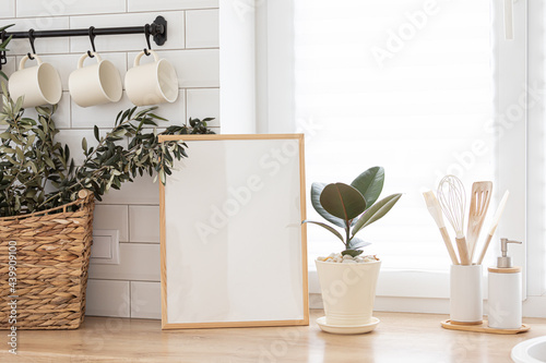Mock up frame in kitchen interior background. Scandinavian home design.