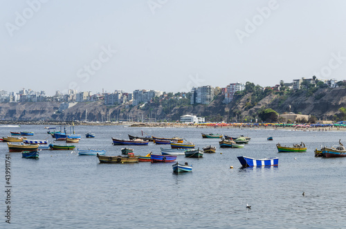 Beautiful boats in the beach Pescadores en Chorrillos , Lima- Peru.
