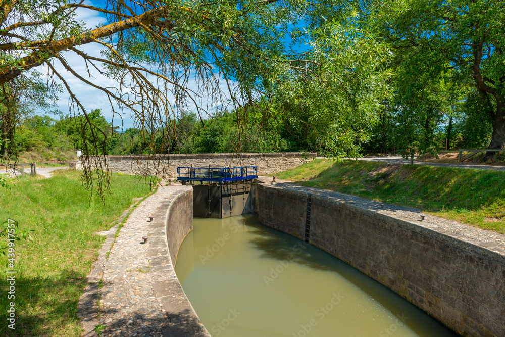The scenic view of the Ecluse Saint Martin on the Canal du Midi, in the South of France The scenic view of the Ecluse Saint Martin on the Canal du Midi, in the South of France