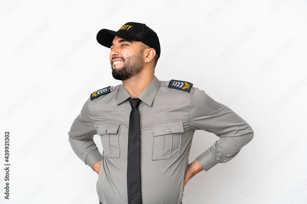 Young arab man isolated on white background suffering from backache for having made an effort Young arab man isolated on white background suffering from backache for having made an effort