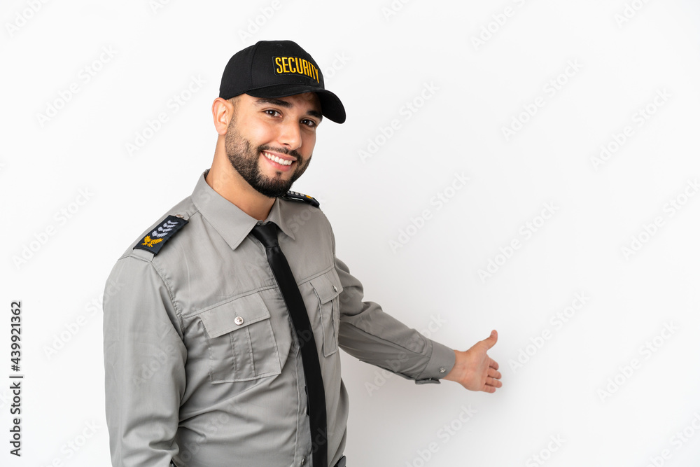 Young arab man isolated on white background extending hands to the side for inviting to come Young arab man isolated on white background extending hands to the side for inviting to come