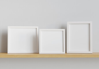Three photo mockup frames shelf. 3D render. 3D illustration.