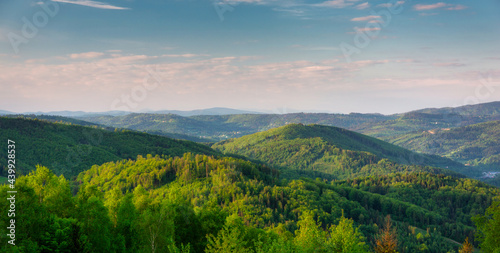 Scenery of the Silesian Beskids from Rownica peak at sunrise. Poland