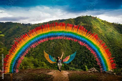 Artificial rainbow over mountains of Huila in Colombia photo