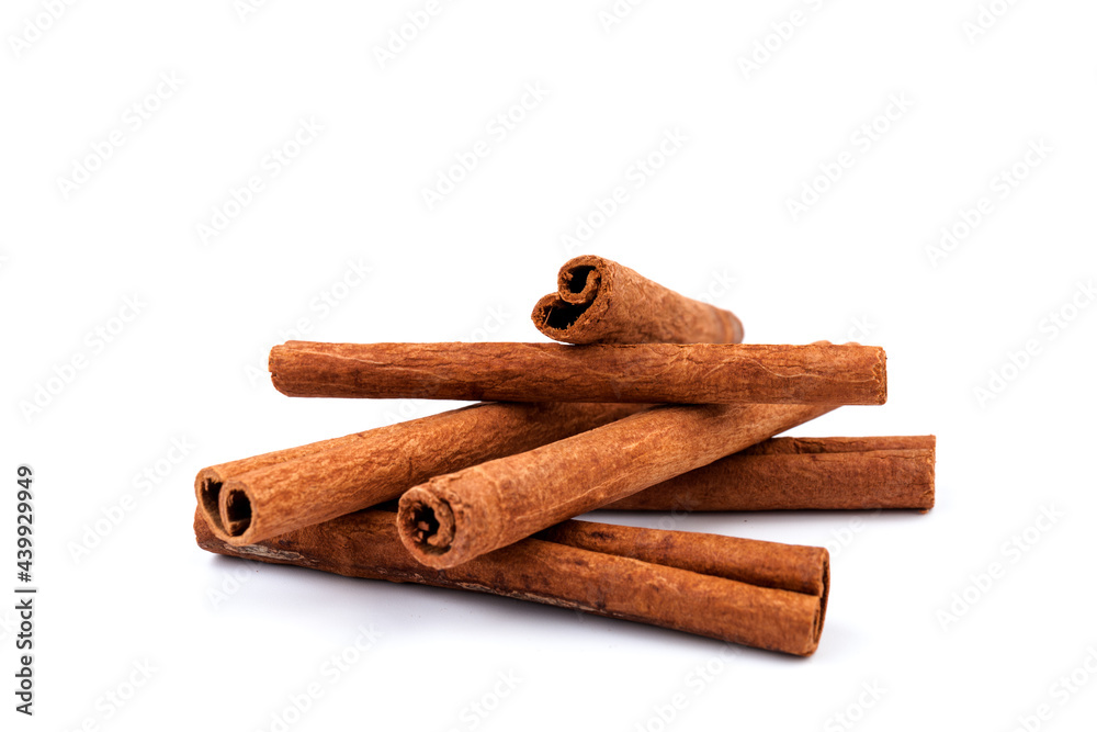 Fragrant cinnamon sticks isolated on white background Fragrant cinnamon sticks isolated on white background