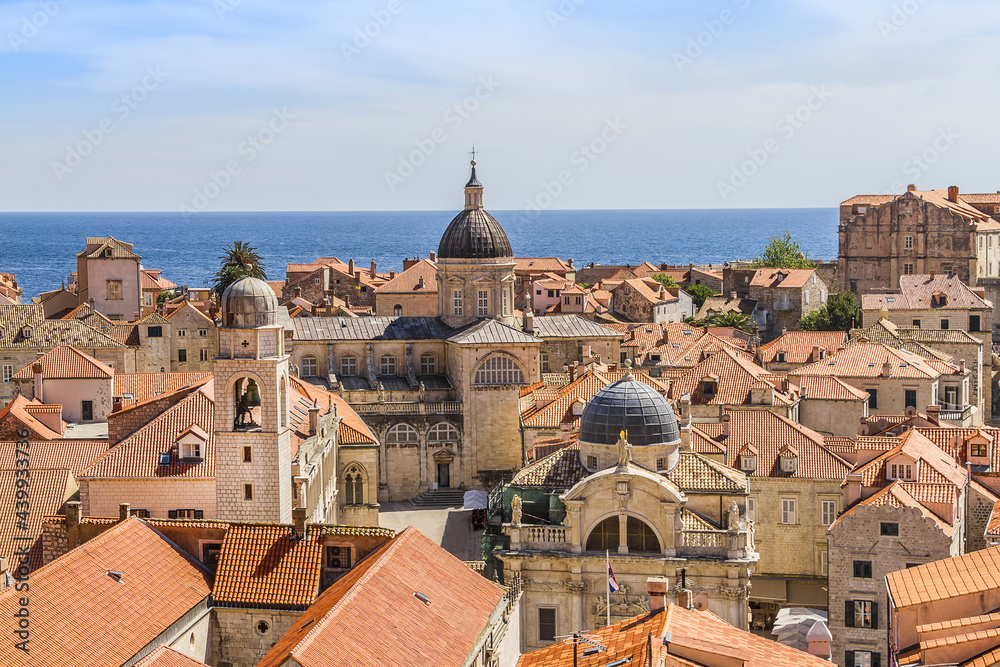 Fototapeta premium Famous clock tower of Dubrovnik, Croatia. Tower built in Main Street of Old city Dubrovnik - Stradun in XV Century. Dubrovnik is one of most prominent tourist destinations in Mediterranean.