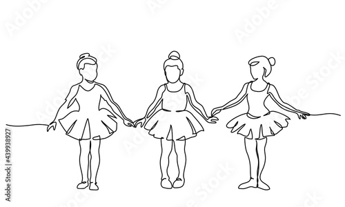 Nice little cute children girls in dance dress dancing ballet.