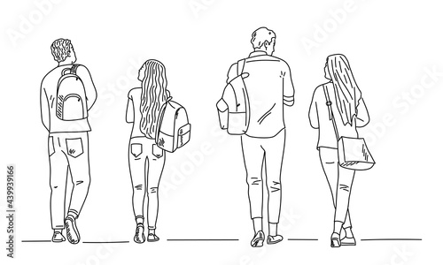 Students friends walk down the street.