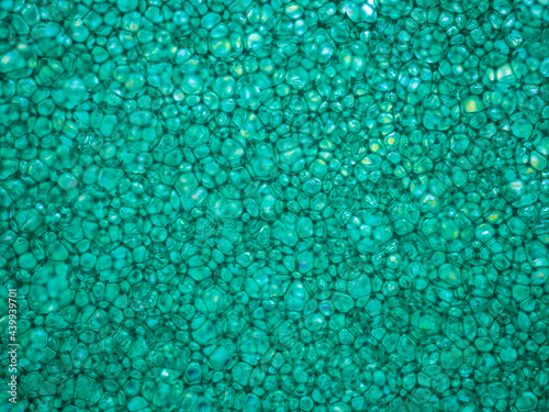 Close-up abstract background made of bubble plastic in turquoise color