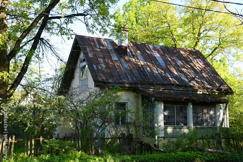 A rural house in the summer. An old village house.