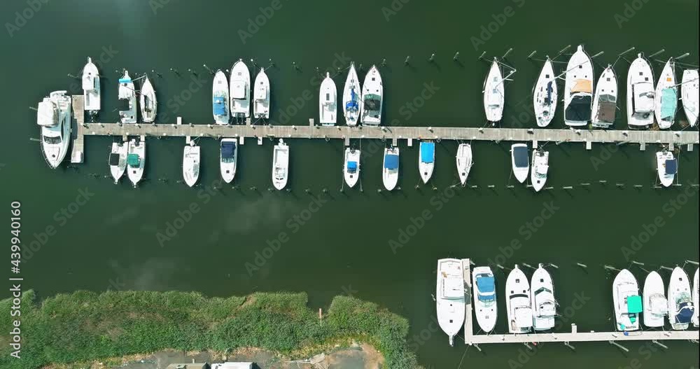 Aerial view panorama of wood platform for boat in the ocean little pier marina Aerial view panorama of wood platform for boat in the ocean little pier marina