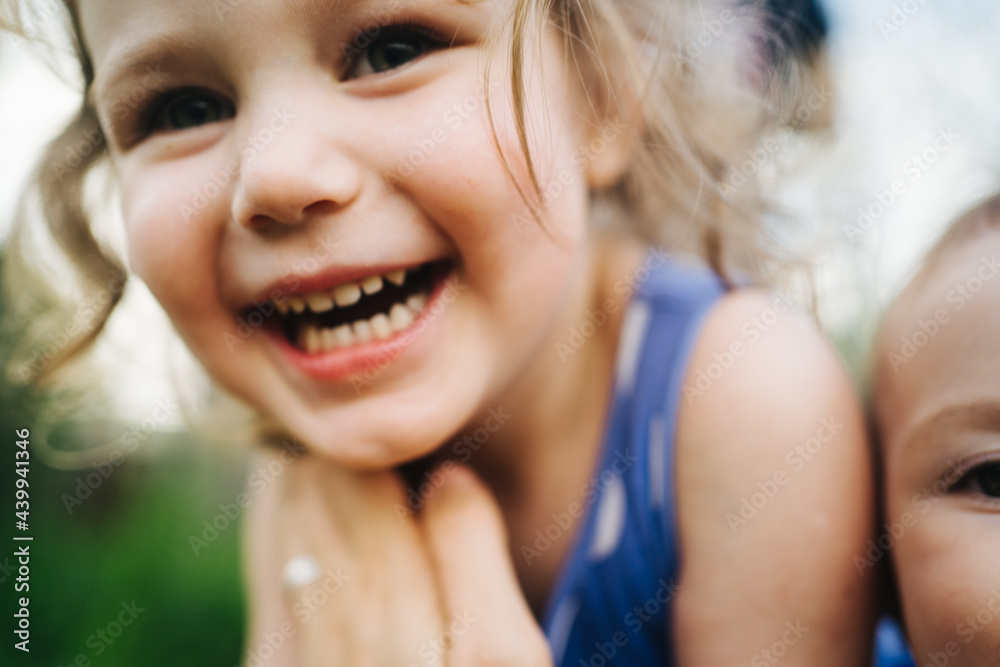 Happy children playing outdoors Happy children playing outdoors