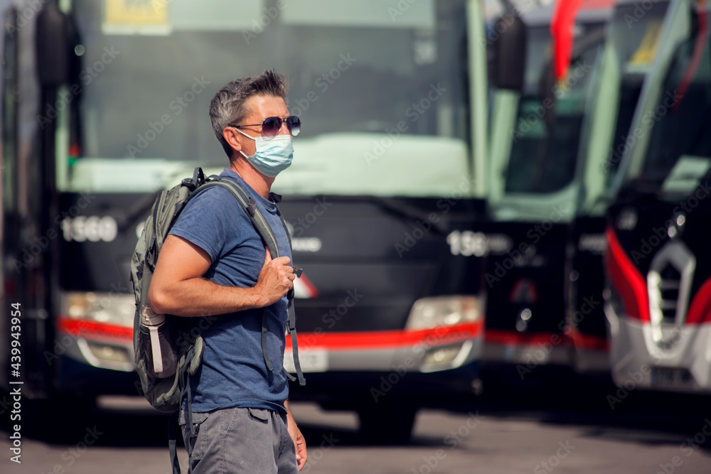 Traveler at the bus station. Travel and tourism concept Traveler at the bus station. Travel and tourism concept