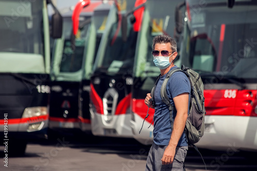 Traveler at the bus station. Travel and tourism concept