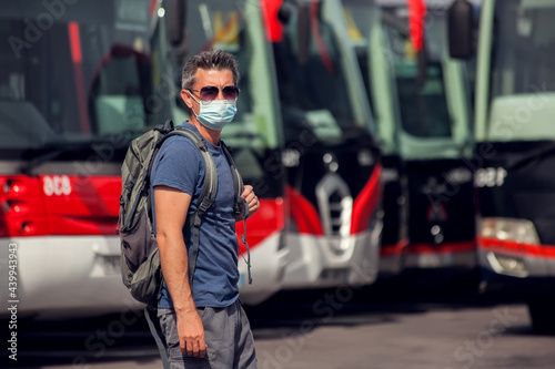 Traveler at the bus station. Travel and tourism concept