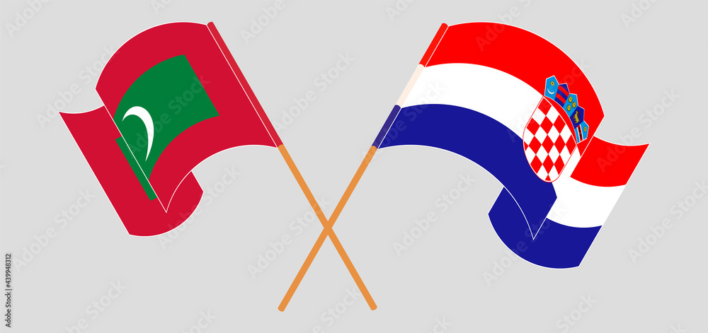 Crossed and waving flags of Maldives and Croatia