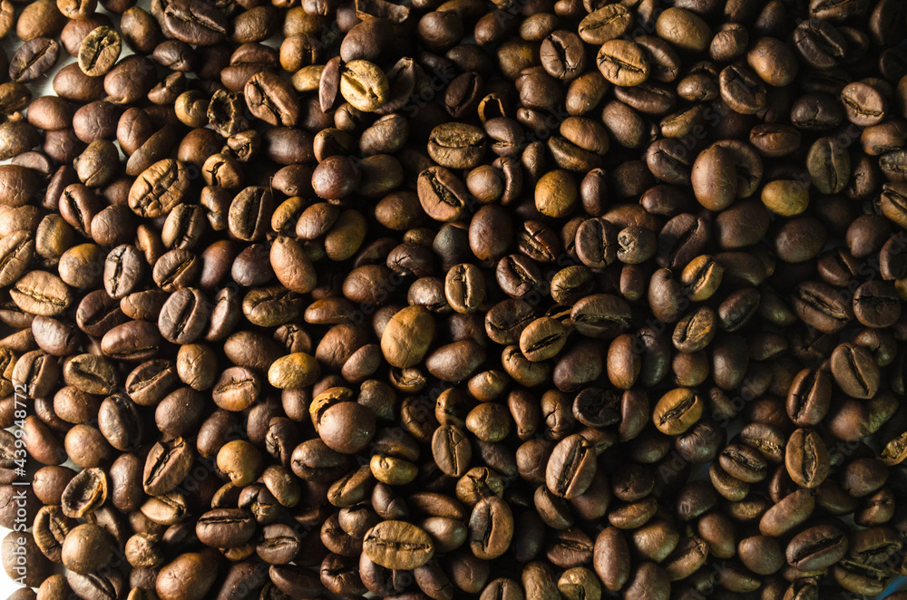 Coffee beans, photo on white table Coffee beans, photo on white table