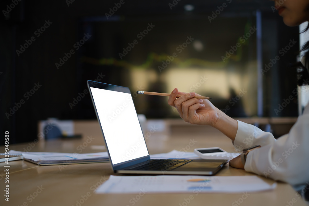 Business woman trader investor using laptop with cryptocurrency stock market graph on background. stock chart, investment concept. Business woman trader investor using laptop with cryptocurrency stock market graph on background. stock chart, investment concept.