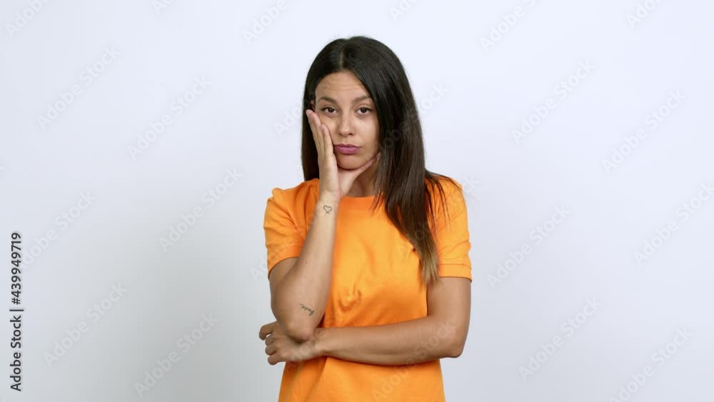 Young woman gaping because have just surprised with a gift over isolated background Young woman gaping because have just surprised with a gift over isolated background