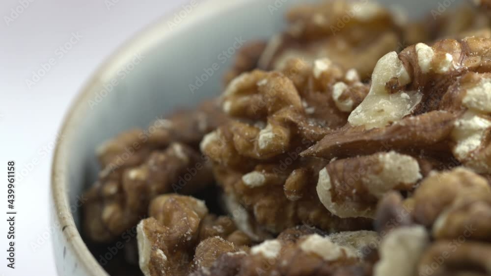 Walnuts Close-Up Macro 4K Shot of Nuts Rotating. Nuts Spinning In Bowl. Protein Plant Based Raw Vegan Food. Health And Vegetarian Foods. Healthy Breakfast Ingredients. Macro 4K Shot. Walnuts Close-Up Macro 4K Shot of Nuts Rotating. Nuts Spinning In Bowl. Protein Plant Based Raw Vegan Food. Health And Vegetarian Foods. Healthy Breakfast Ingredients. Macro 4K Shot.