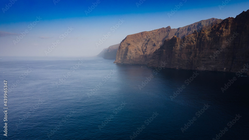 Photo with drone of the coast in the canary islands and landscape of mountains