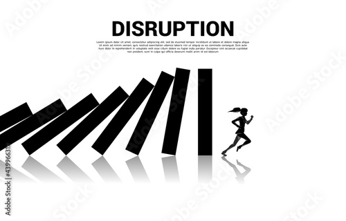 surviving business disruption. Silhouette of businesswoman run away from domino collapse with graph background. Concept of business industry disrupt