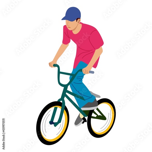 Young boy showing off freestyle trick with bicycle