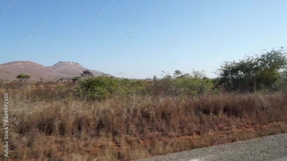 Natural Scenery Of Semi-arid Desert In Madagascar. POV Driving On The Road. Natural Scenery Of Semi-arid Desert In Madagascar. POV Driving On The Road.