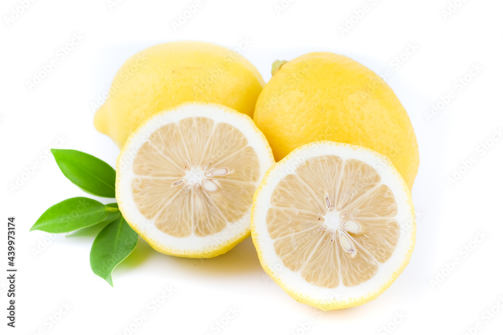 Yellow Lemon citrus half slices with leaf isolated on white background Yellow Lemon citrus half slices with leaf isolated on white background