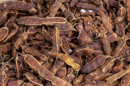 Closeup of Organic Ripe Tamarind in a Vegetable Market for Selling