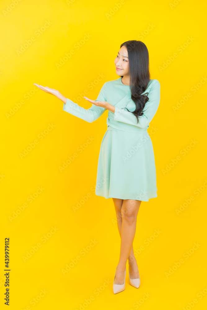 Portrait beautiful young asian woman smile with action Portrait beautiful young asian woman smile with action