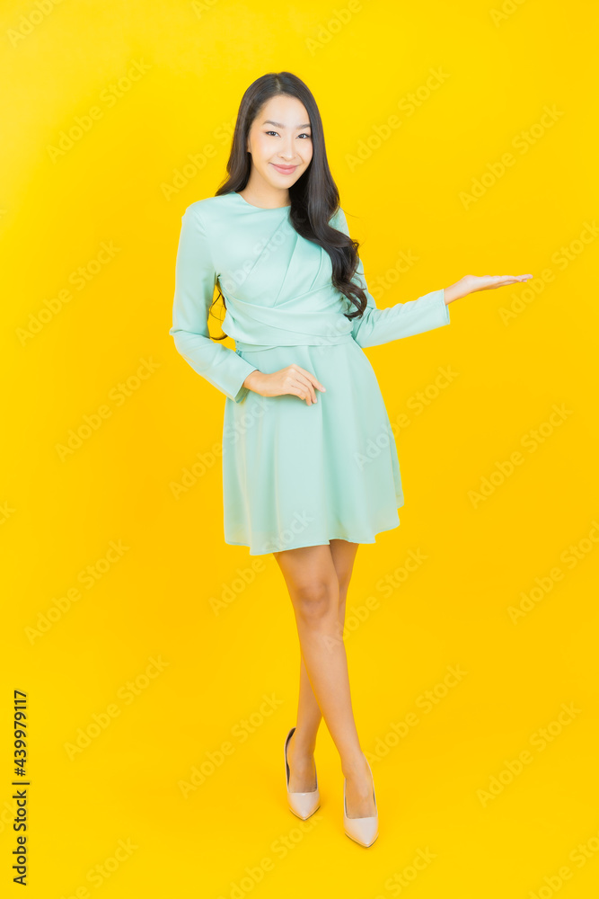 Portrait beautiful young asian woman smile with action Portrait beautiful young asian woman smile with action
